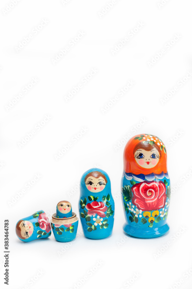 wooden Russian dolls of 4 pieces on a white background wooden Russian dolls of 4 pieces on a white background