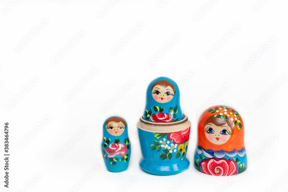  Russian dolls of 3 pieces on a white background