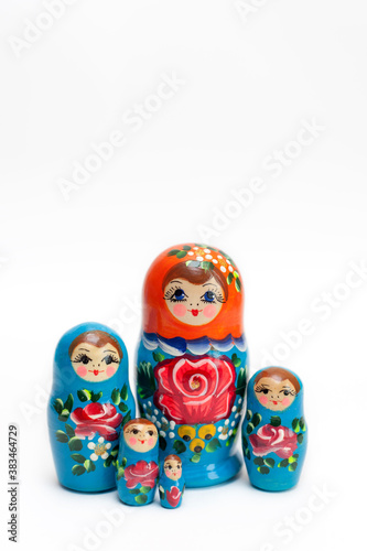  wooden dolls on a white background