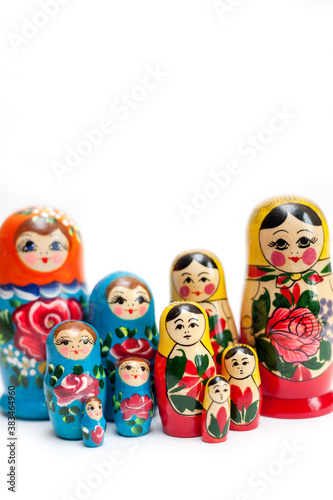  wooden Russian dolls on a white background