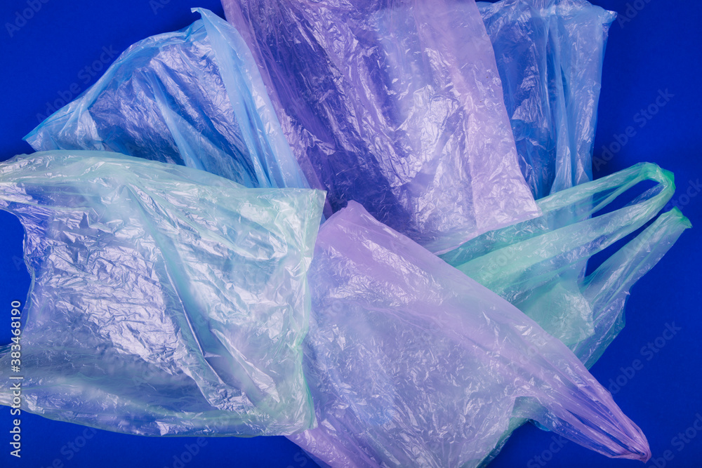 Obraz premium A lot of colorful plastic bags background. Against Pollution concept.