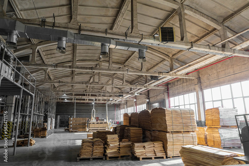 Industrial plant shop with stocked wooden veneer for plywood and furniture production