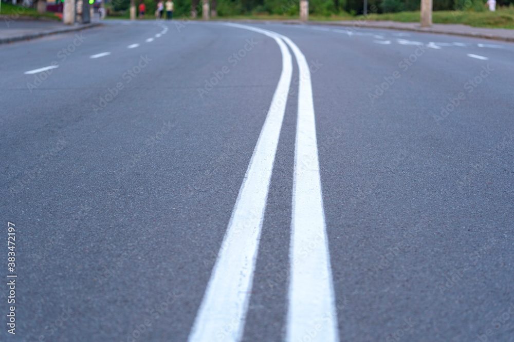 Turn on the road. The highway with a white marking. Turn on the road. The highway with a white marking.