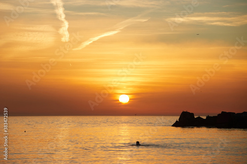 Obraz na płótnie Barceloneta beach at sunrise in Barcelona, Spain w salonie