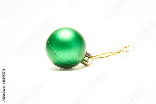 Green Christmas ball on a white background, New Year, Christmas toys, holiday, Christmas.