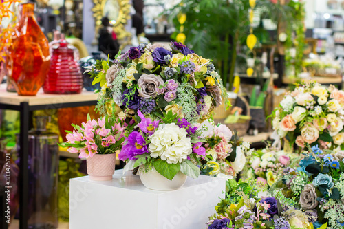 Bouquets of artificial flowers, rose hydrangea violet crocus, floristry. flower sales, interior design