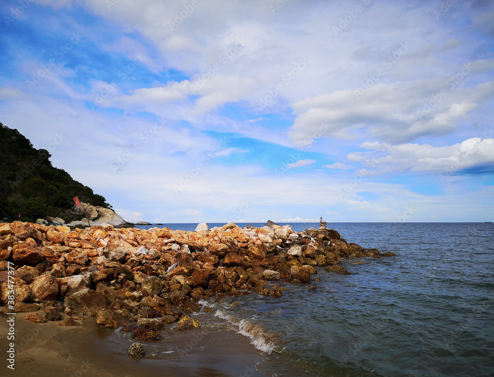 Beautiful rocks, calm sea on a clear day