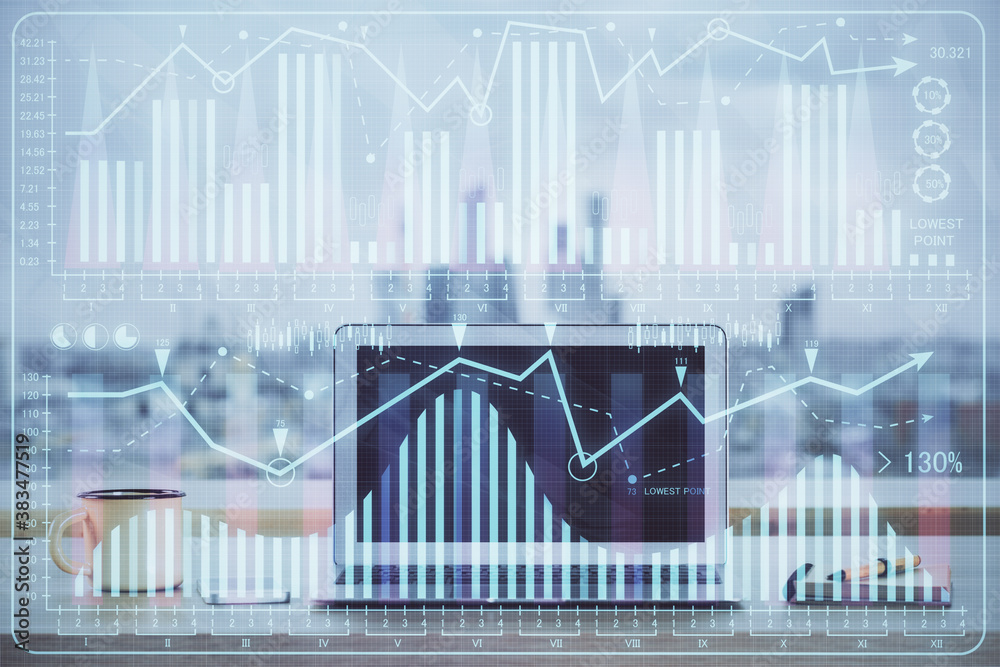 Financial chart drawing and table with computer on background. Multi exposure. Concept of international markets. Financial chart drawing and table with computer on background. Multi exposure. Concept of international markets.