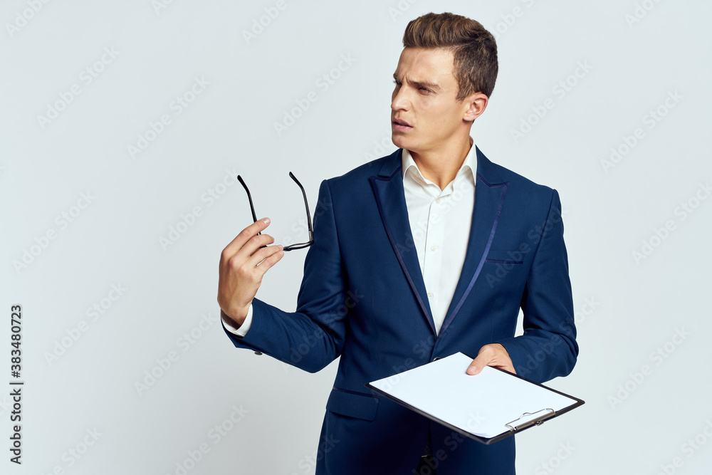 Businesswoman in suit glasses holding office documents self-confidence Businesswoman in suit glasses holding office documents self-confidence