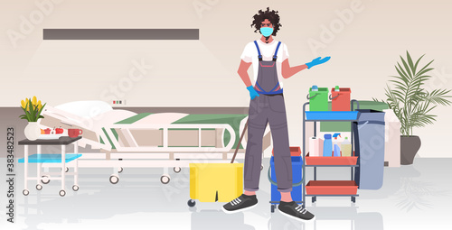 male professional cleaner in uniform man janitor using cleaning equipment hospital ward interior full length horizontal vector illustration