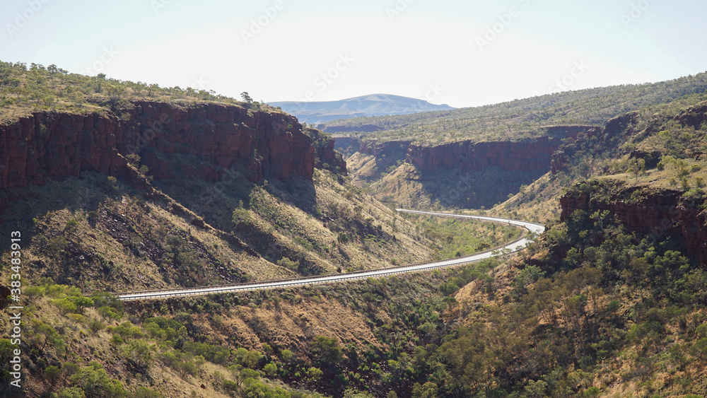 Hiking and camping in the hilly landscapes near Dales Gorge and Karijini National Park in Western Australia.