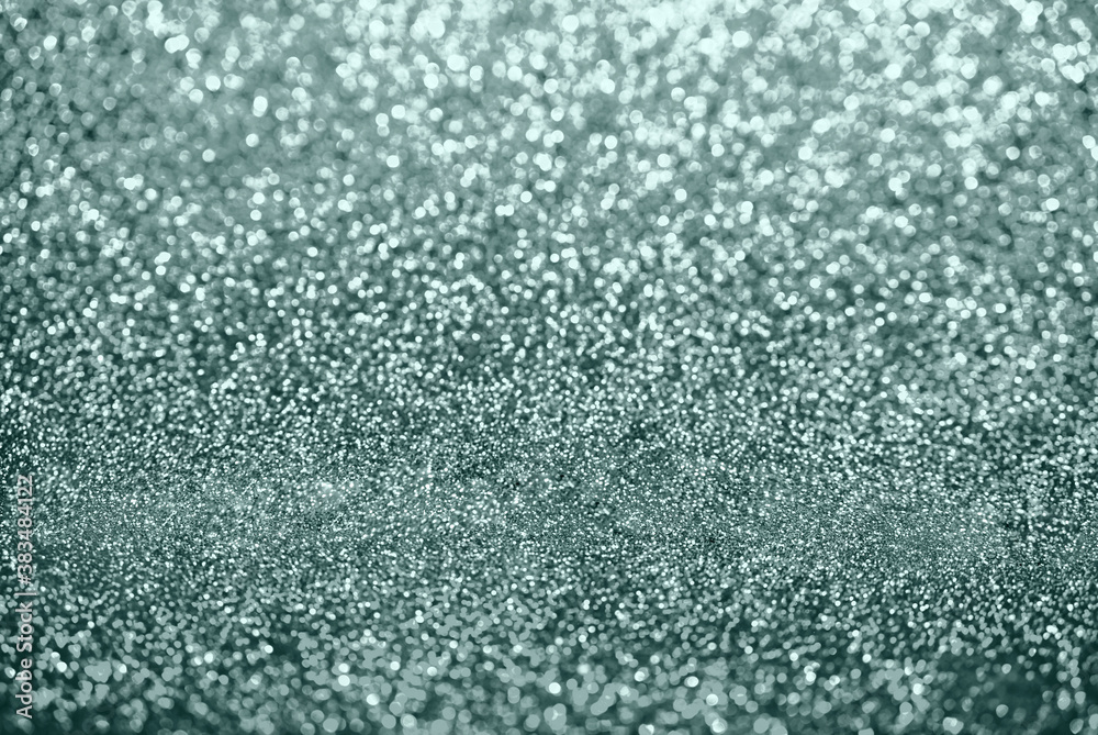 Obraz premium Dark green bokeh abstract light defocused background.
