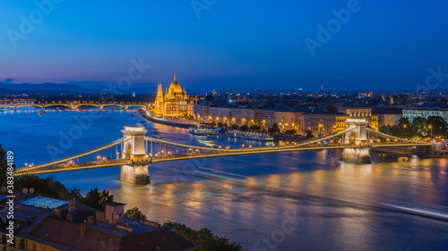 Beautiful panoramic view of Budapest cityscape with the Chain Bridge and the Hungarian Parliament at night © majonit