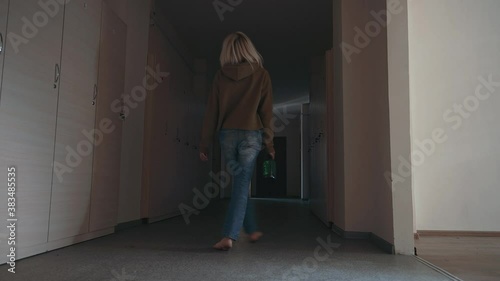 Miserable woman in depression, drinking alcohol