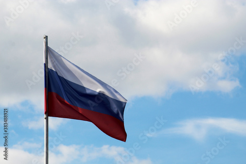 Free Download The Russian flag, the tricolor waving on the wind - GFXLoad