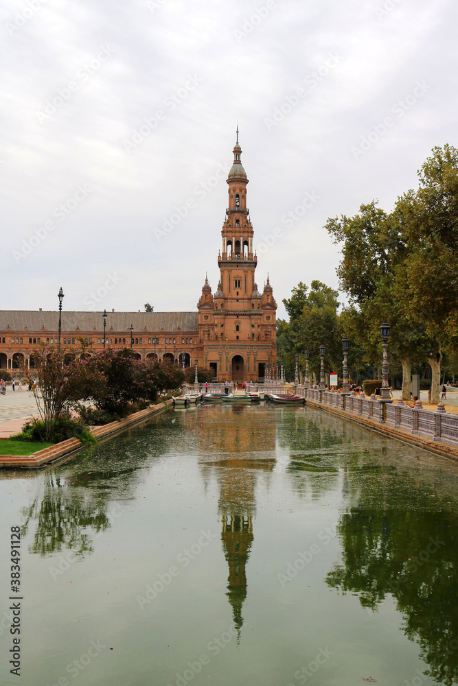 Cityscape of Spain Square architecture building with an empty lake in Seville - Winter landscape postcard	