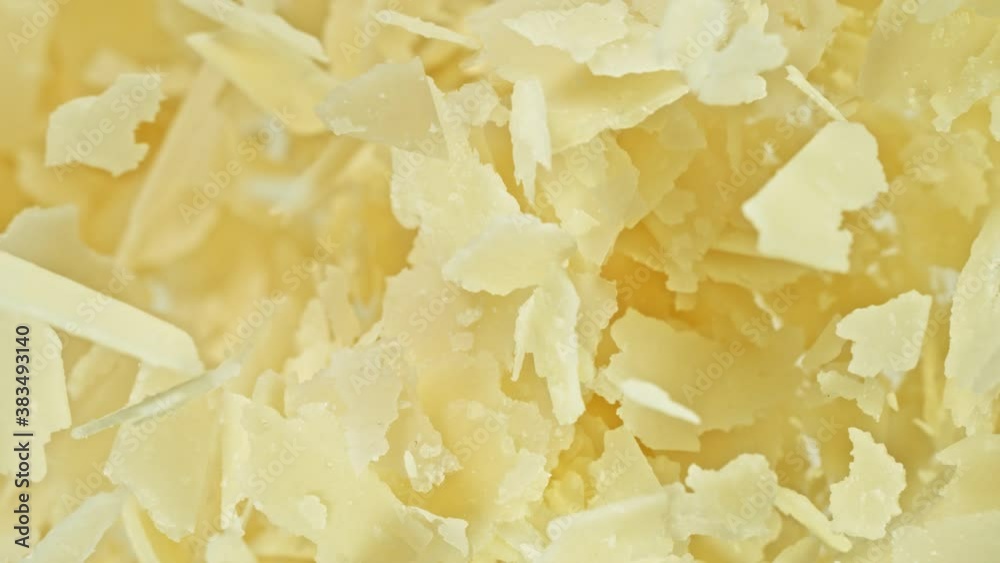 Super Slow Motion Detail Shot of Flying Parmesan Shavings at 1000 fps. Super Slow Motion Detail Shot of Flying Parmesan Shavings at 1000 fps.