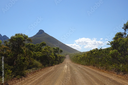 Fototapeta Naklejka Na Ścianę i Meble -  Dirt Road with mountain view in Stirling Range National Park in Western Australian Outback