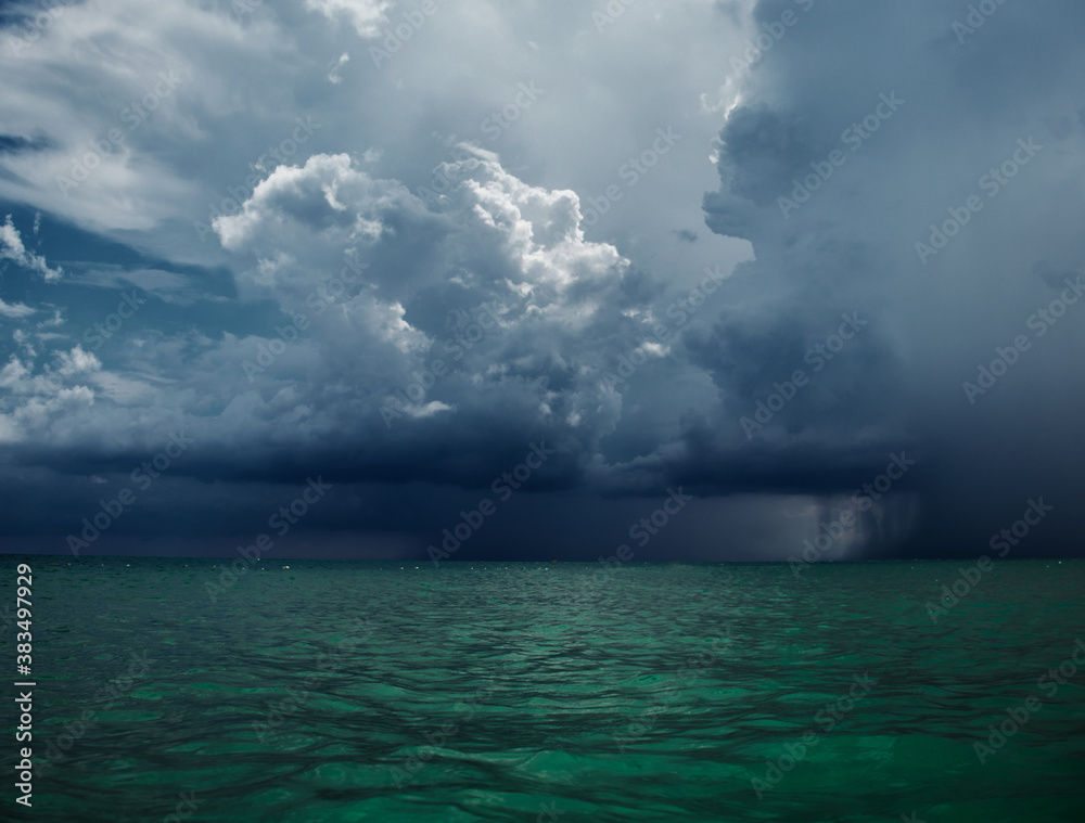 Mediterranean Sea with storm in the background, transparent water