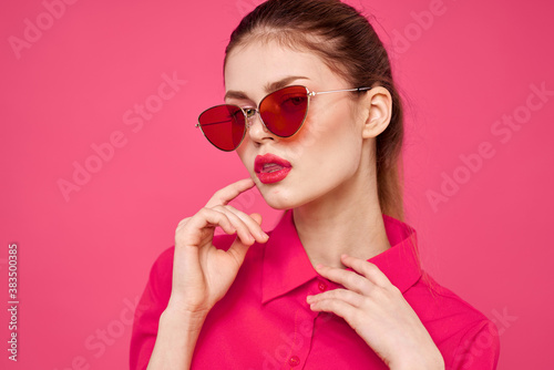 Woman in pink shirt and brown glasses cropped view fashion model emotions gesturing hands portrait © SHOTPRIME STUDIO