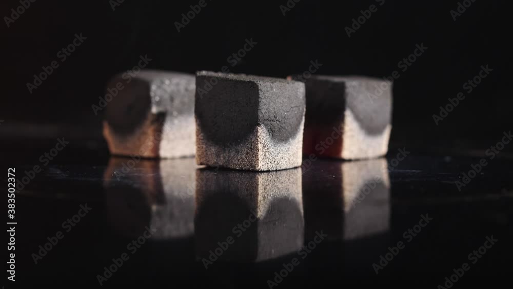 three coconut coals burn quickly on an electric burner. Hookah charcoal