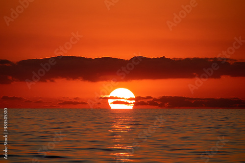 Fire sunset in the sea © Alexey