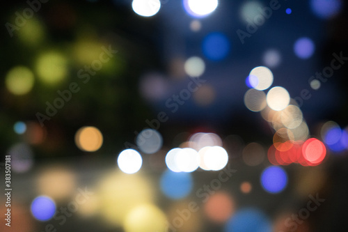 City blurring lights abstract bokeh on dark background © luchschenF