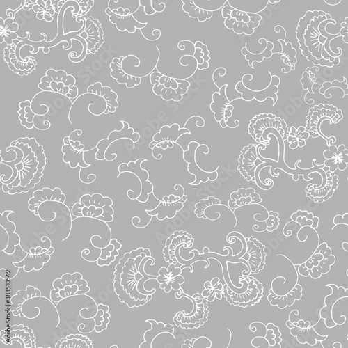 Doodle seamless pattern. Floral ornament. Wallpaper  textile or wrapping paper. Gray background. Hand drawn Vector illustration