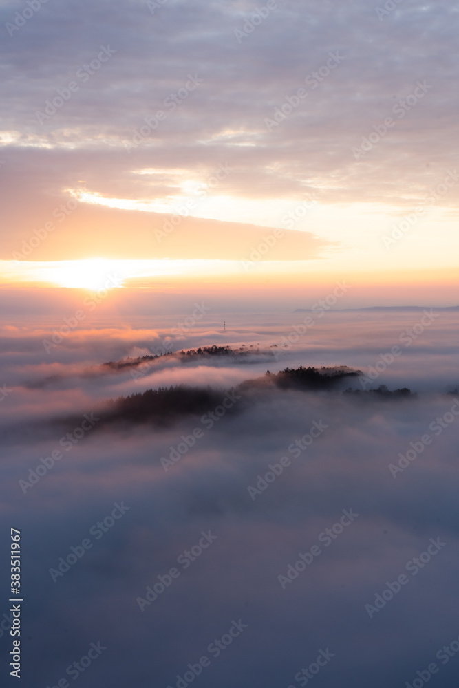 sunrise over fog