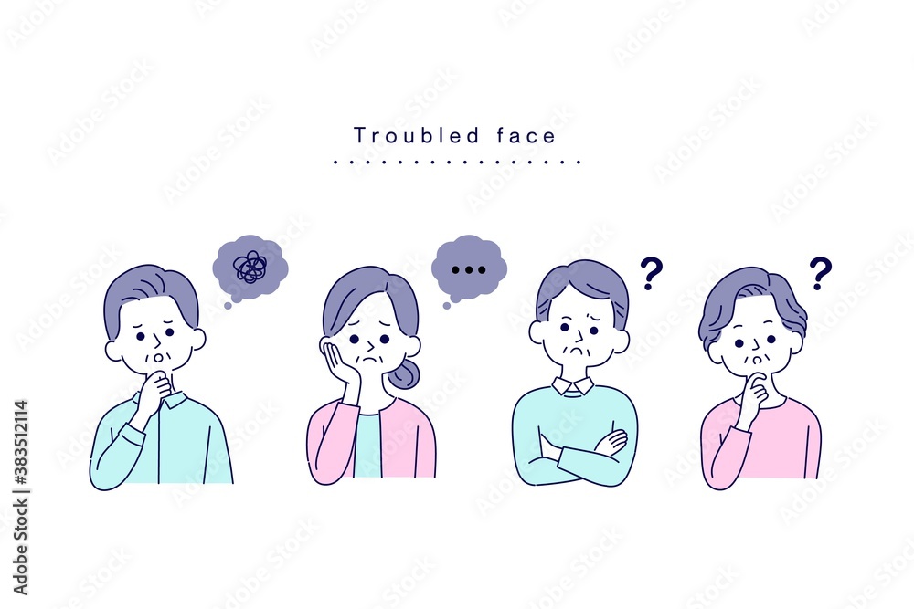 困った表情のシニア男女