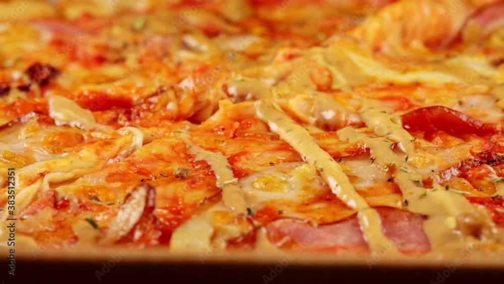 Freshly prepared pizza in a cardboard box. Freshly prepared pizza in a cardboard box.