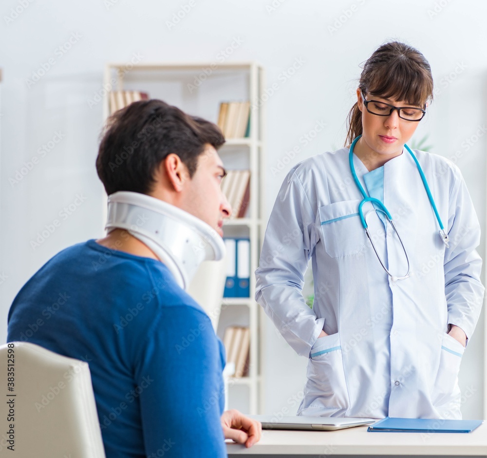 Doctor is explaining to patient with neck injury Doctor is explaining to patient with neck injury