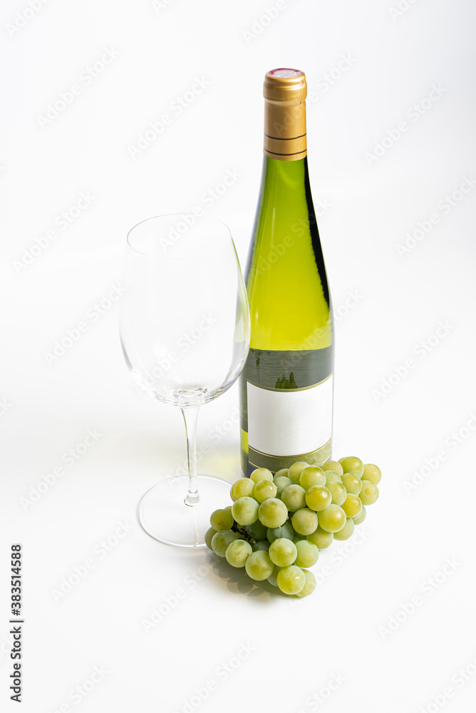 Bottle of white wine and glasses isolated on white