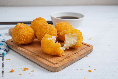 Obraz na plátně Yellow delicious fried ball cheese