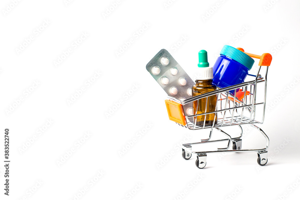 Cold and flu remedies in grocery cart. Tables, nasal drops, rubbing ointment. Cold and flu remedies in grocery cart. Tables, nasal drops, rubbing ointment.