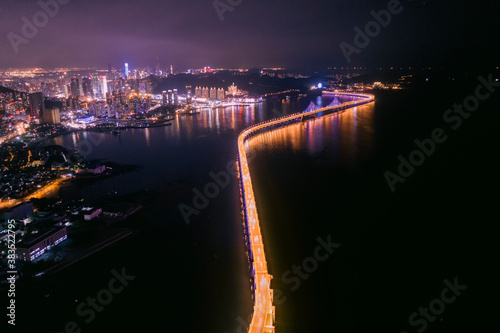 Aerial photo of the lights of the cross sea bridge at night was taken in Dalian, Liaoning Province, Asia
