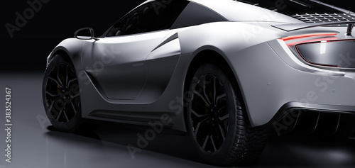 Fototapeta Naklejka Na Ścianę i Meble -  Rear view of modern fast sports car in studio light. Brandless generic contemporary design
