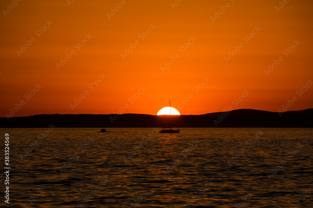Colorful sunset at the Adriatic sea photographed in Zadar, Dalmatia, Croatia Colorful sunset at the Adriatic sea photographed in Zadar, Dalmatia, Croatia