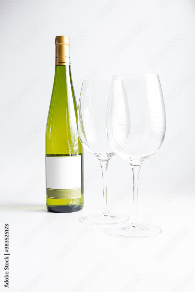 Glasses and bottle of wine on white background Glasses and bottle of wine on white background