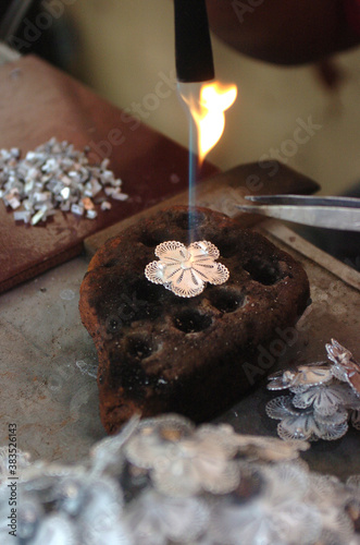 Melting silver at a silversmith workshop for jewelry in Kotagede, Yogyakarta, Indonesia