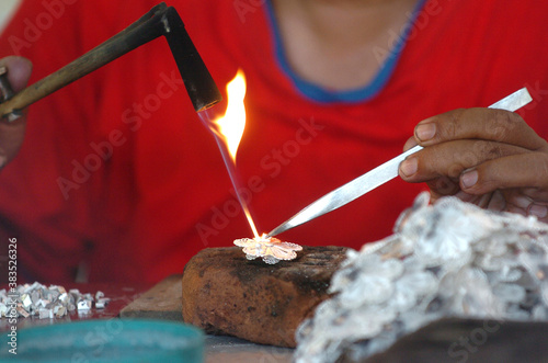 Melting silver at a silversmith workshop for jewelry in Kotagede, Yogyakarta, Indonesia photo