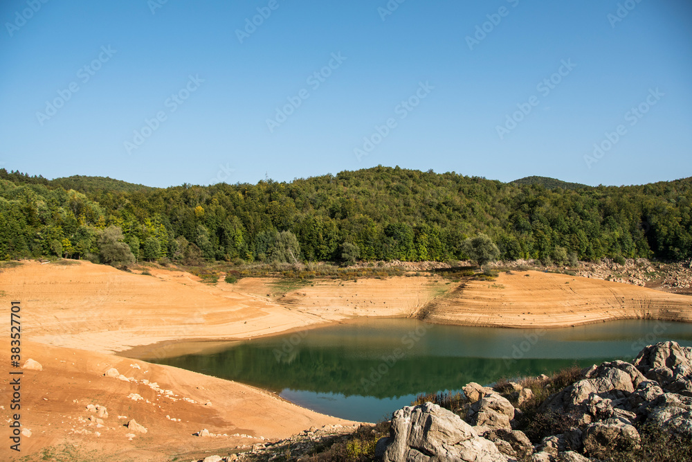 Kruscica lake is the accumulation lake that was built by damming Lika river. It has eighty-meter-high dam and on the bottom of the lake in its depths lies a sunken village and the church of St. Eliah Kruscica lake is the accumulation lake that was built by damming Lika river. It has eighty-meter-high dam and on the bottom of the lake in its depths lies a sunken village and the church of St. Eliah