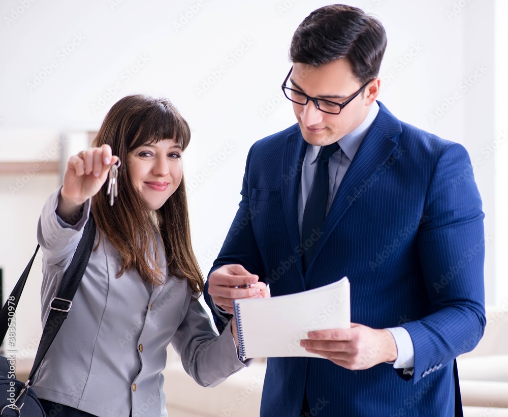 Real estate agent showing new apartment to owner Real estate agent showing new apartment to owner