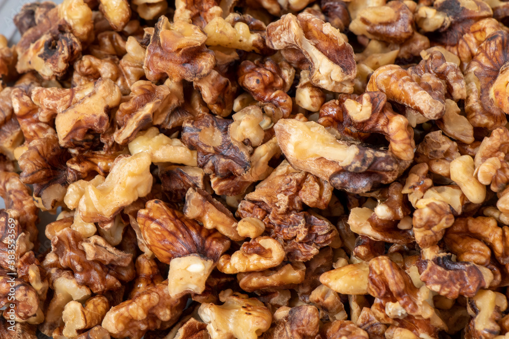 close-up walnuts on a plate close-up walnuts on a plate
