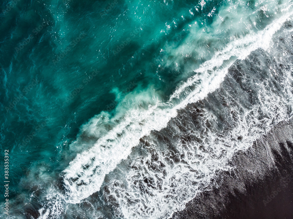 Fototapeta Soft wave of blue ocean on sandy beach.