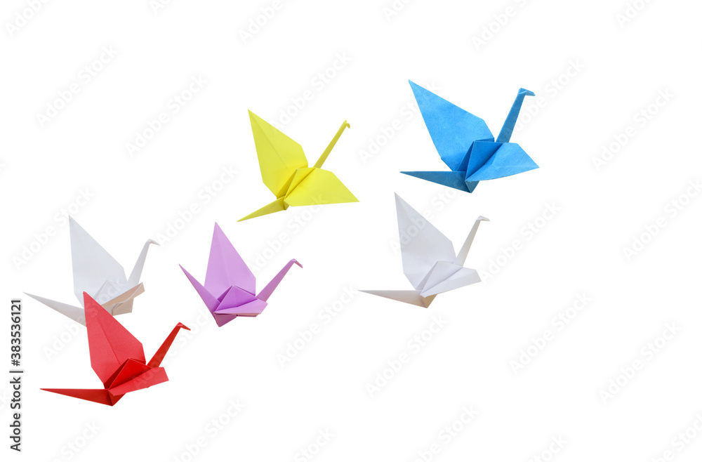 Origami birds flying on white Origami birds flying on white