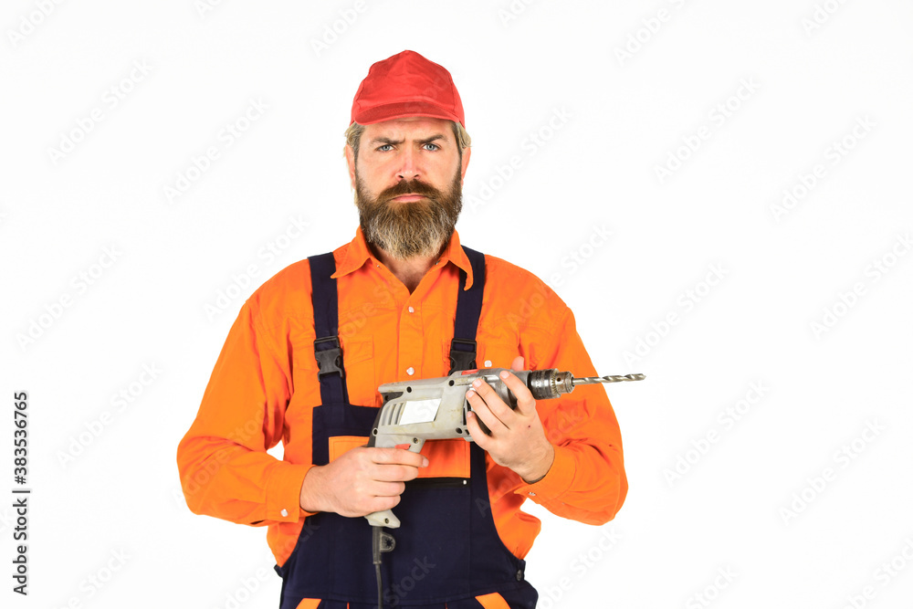 How to Drill Wall Without Hitting Something. Man in cap with drills white background. Builder repairman makes hole. Safety measures. Drilling concept. Perforator and bit. Powerful drill. Buy drill How to Drill Wall Without Hitting Something. Man in cap with drills white background. Builder repairman makes hole. Safety measures. Drilling concept. Perforator and bit. Powerful drill. Buy drill