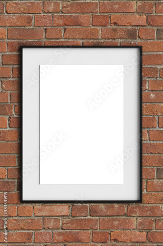 Empty passepartout frame mock-up template on brick wall