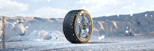 Single winter tire in the snow in winter photo