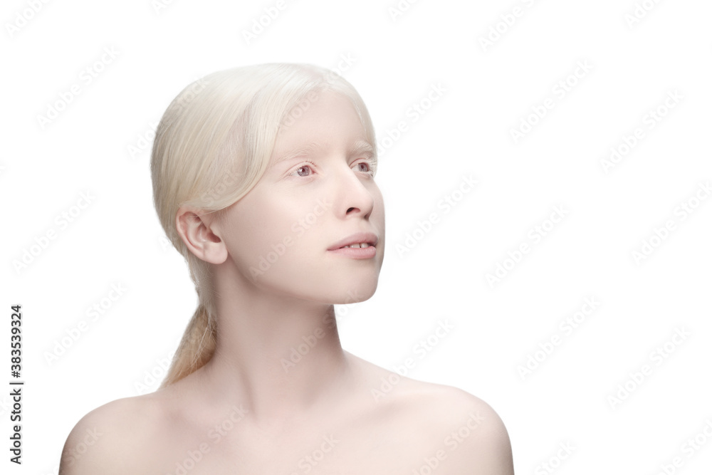 Innocent. Portrait of beautiful albino woman isolated on white studio